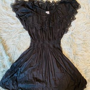 Ruffle off the shoulder dress. Very cute with lots of detail.